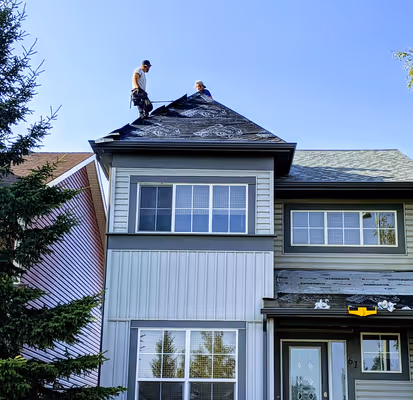 guys on top of roof